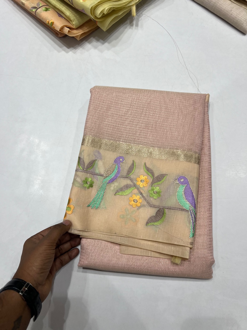 Rose saree with embroidered birds and floral motifs